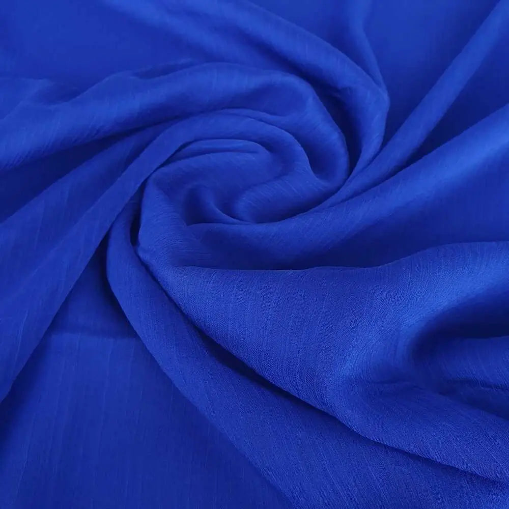 Azul royal vivo em chiffon musseline liso, perfeito para peças fluidas.